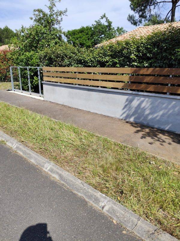 paysagiste pour la réalisation d'une clôture en lame IPE