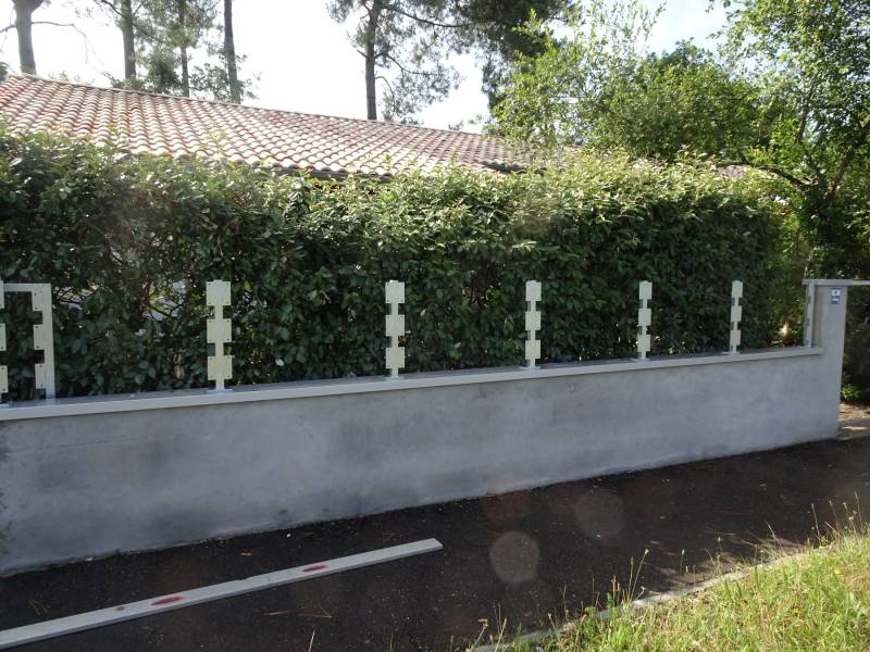 paysagiste pour la réalisation d'une clôture en lame IPE