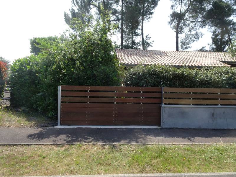 paysagiste pour la réalisation d'une clôture en lame IPE