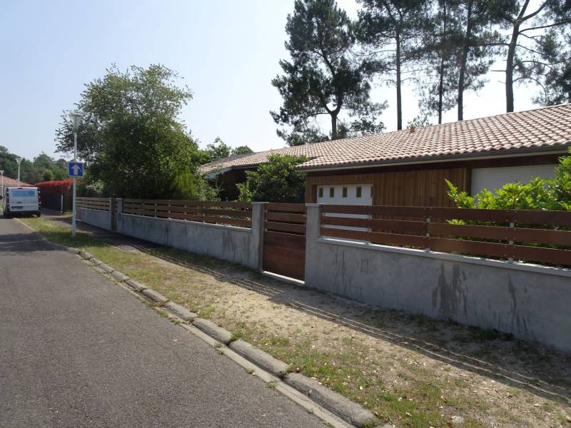 paysagiste pour la réalisation d'une clôture en lames IPE